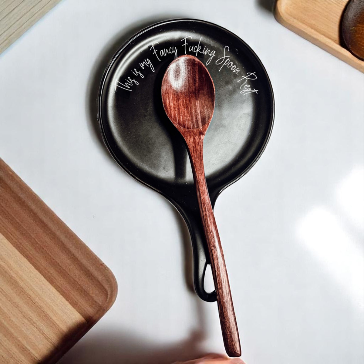 Designer spoon holder
Upscale kitchen gifts
Modern black kitchen decor
Sophisticated cooking accessories
Designer spoon rest
Artistic kitchen decor